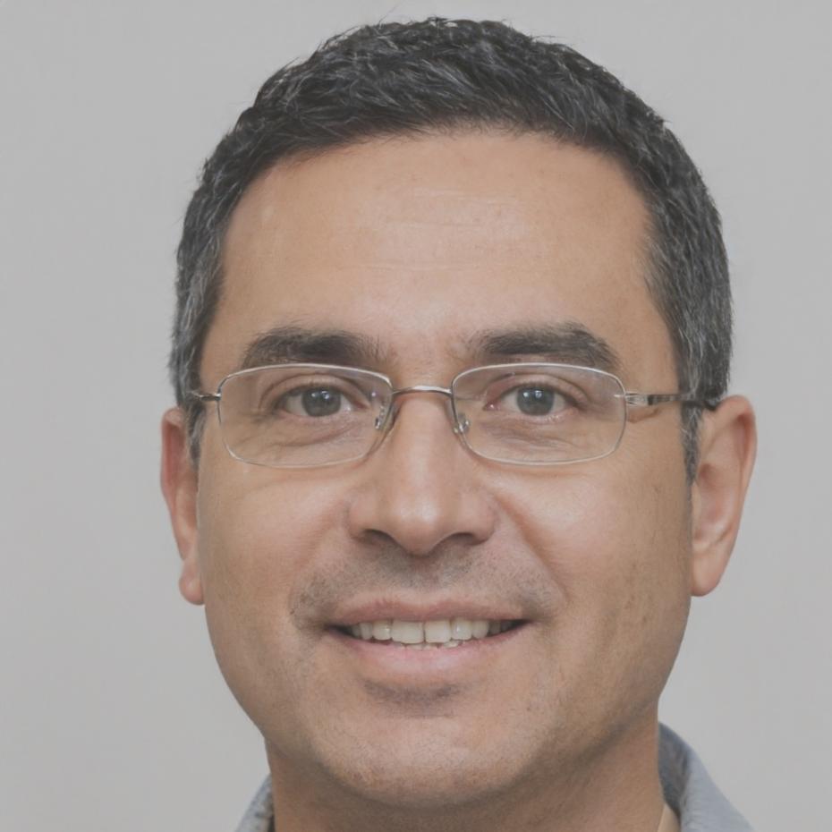 Professional headshot of Viktor Adamek, DevOps Engineer